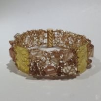 Crocheted Gold Cuff with Oregon Sunstone by Veronica Stewart at The Avenue Gallery, a contemporary fine art gallery in Victoria, BC, Canada.
