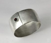 Sterling Silver and Garnet Bracelet by Brenda Roy at The Avenue Gallery, a contemporary fine art gallery in Victoria, British Columbia, Canada.