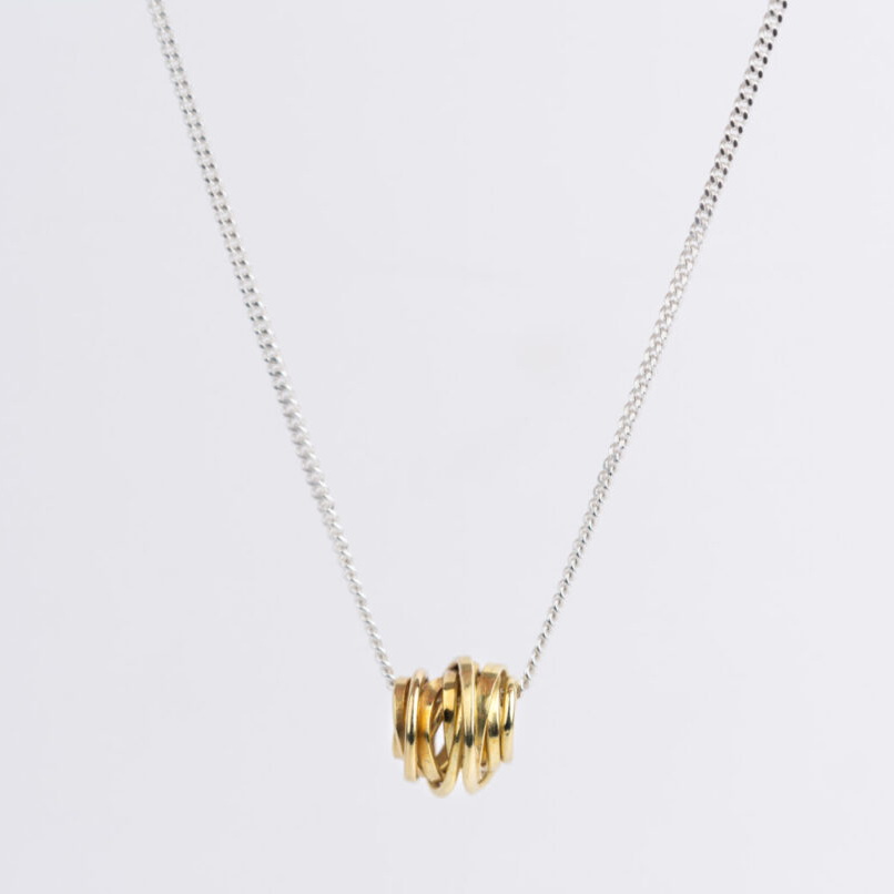 Onefooter Necklace with 18kt Yellow Gold Pendant by Dorothée Rosen at The Avenue Gallery, a contemporary fine art gallery in Victoria, BC, Canada.