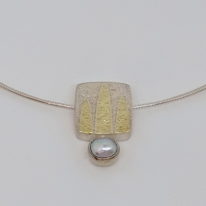 Golden Forest Necklace by Andrea Roberts at The Avenue Gallery, a contemporary art gallery in Victoria BC, Canada.