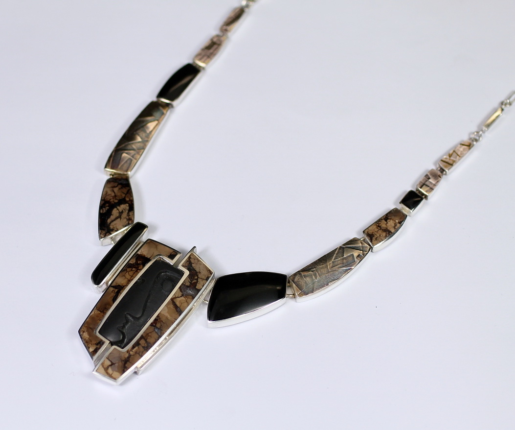 Face Necklace by Brenda Roy at The Avenue Gallery, a contemporary fine art gallery in Victoria, BC, Canada.