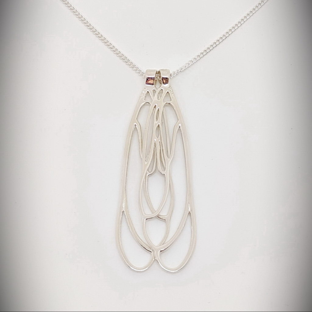 Dragonfly Double Wing Necklace by Dorothee Rosen at The Avenue Gallery, a contemporary art gallery in Victoria BC., Canada