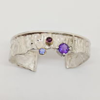 Amethyst, Tanzanite & Rhodolite Garnet Cuff Bracelet at The Avenue Gallery, a contemporary fine art gallery in Victoria, BC, Canada.