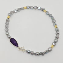 Purple Rain Necklace by Andrea Roberts at The Avenue Gallery, a contemporary fine art gallery in Victoria, BC, Canada.