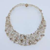 Gold-Filled Crochet Collar with Freshwater Pearls and Swarovski Crystals by Veronica Stewart at The Avenue Gallery, a contemporary fine art gallery in Victoria, BC, Canada.
