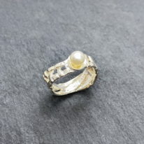 Skinny Woven Basket Ring with Mini White Pearl by Chi's Creations at The Avenue Gallery, a contemporary fine art gallery in Victoria, BC, Canada.