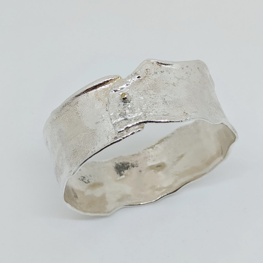 Medium Reticulated Silver Bangle with Gold Ball by Barbara Adams at The Avenue Gallery, a contemporary fine art gallery in Victoria, BC, Canada.