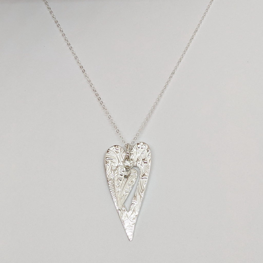 Mother & Child Pendant by Veronica Stewart at The Avenue Gallery, a contemporary fine art gallery in Victoria, BC, Canada.