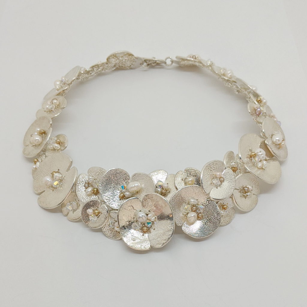 Euphorbia Collar by Veronica Stewart at The Avenue Gallery, a contemporary fine art gallery in Victoria, BC, Canada.