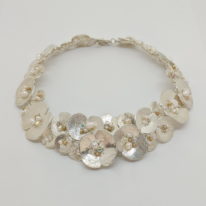 Euphorbia Collar by Veronica Stewart at The Avenue Gallery, a contemporary fine art gallery in Victoria, BC, Canada.