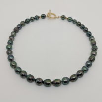 Tahitian Pearl Necklace with Gold-Filled Toggle Clasp by Val Nunns at The Avenue Gallery, a contemporary fine art gallery in Victoria, BC, Canada.