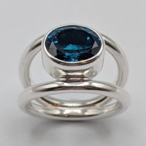 Double Band Ring with London Blue Topaz by A & R Jewellery at The Avenue Gallery, a contemporary fine art gallery in Victoria, BC, Canada.