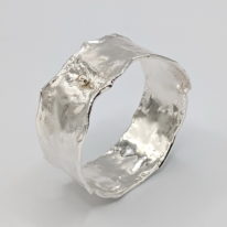 Wide Reticulated Silver Bangle with Gold Ball by Barb Adams at The Avenue Gallery, a contemporary fine art gallery in Victoria, BC, Canada.