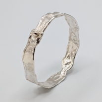 Narrow Reticulated Silver Bangle with Gold Ball by Barbara Adams at The Avenue Gallery, a contemporary fine art gallery in Victoria, BC, Canada.