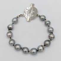 Tahitian Pearl Bracelet with Hammered Sterling Silver Toggle Clasp by Val Nunns at The Avenue Gallery, a contemporary fine art gallery in Victoria, BC, Canada.