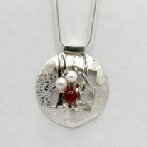 Woven Disc Necklace with Pearls and Carnelian by Chi's Creations at The Avenue Gallery, a fine art gallery in Victoria BC., Canada