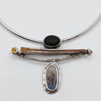 Beach Stone, Dendritic Agate, Hessonite & Mammoth Ivory Pendant by Andrea Russell at The Avenue Gallery, a contemporary fine art gallery in Victoria, BC, Canada.