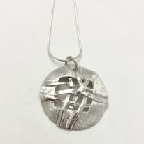 Woven Basket Small Round Disc Necklace by Chi's Creations at The Avenue Gallery, a contemporary fine art gallery in Victoria, BC, Canada.