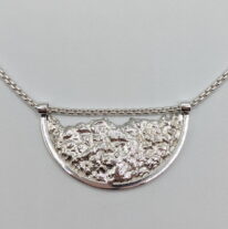 Lunar Crescent Moon Pendant by A & R Jewellery at The Avenue Gallery, a contemporary fine art gallery in Victoria, BC, Canada.