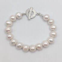 White Freshwater Pearl "Classic Bracelet" by Val Nunns at The Avenue Gallery, a contemporary fine art gallery in Victoria, BC, Canada.