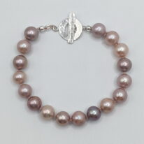 Edison Pearl Bracelet Knotted with Toggle Clasp by Val Nunns at The Avenue Gallery, a contemporary fine art gallery in Victoria, BC, Canada.