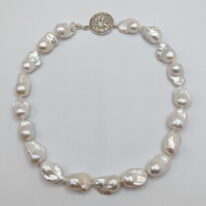 White Baroque Pearl Necklace with Sterling Silver Clasp by Val Nunns at The Avenue Gallery, a contemporary fine art gallery in Victoria, BC, Canada.
