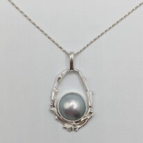Pearl in Hollow Boulder Pendant by A & R Jewellery at The Avenue Gallery, a contemporary fine art gallery in Victoria, BC, Canada.