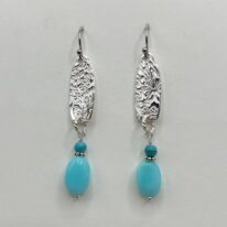 Silver Oval Earrings with Peruvian Opals by Veronica Stewart at The Avenue Gallery, a contemporary fine art gallery in Victoria, BC, Canada.