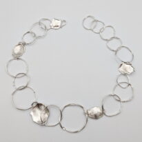 Hollow Boulders with Suns Necklace by A & R Jewellery at The Avenue Gallery, a contemporary fine art gallery in Victoria, BC, Canada.