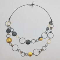 Round & Round Necklace by Air & Earth Design at The Avenue Gallery, a contemporary fine art gallery in Victoria, BC, Canada.