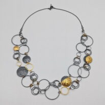 Round & Round Necklace by Air & Earth Design at The Avenue Gallery, a contemporary fine art gallery in Victoria, BC, Canada.
