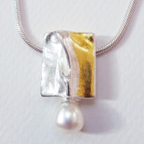 Fold Pendant by Andrea Roberts at The Avenue Gallery, a contemporary fine art gallery in Victoria, BC, Canada.