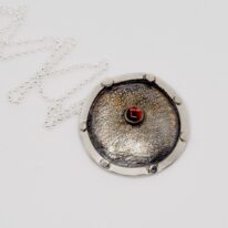 Shield Pendant by ARTYRA Studio at The Avenue Gallery, a contemporary fine art gallery in Victoria, BC, Canada.