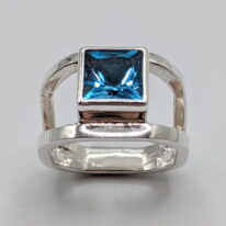 Octagon Double-Band Ring with London Topaz by A & R Jewellery at The Avenue Gallery, a contemporary fine art gallery in Victoria, BC, Canada.