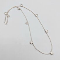 Camellia Necklace by MichaudMichaud Design at The Avenue Gallery, a contemporary fine art gallery in Victoria, BC, Canada.