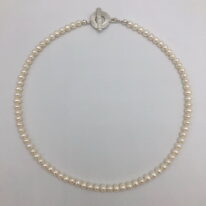 White Freshwater Pearl Necklace by Val Nunns at The Avenue Gallery, a contemporary fine art gallery in Victoria, BC, Canada.