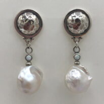 White Baroque Pearl Earrings with Sterling Silver Coin Post by Val Nunns at The Avenue Gallery, a contemporary fine art gallery in Victoria, BC, Canada.