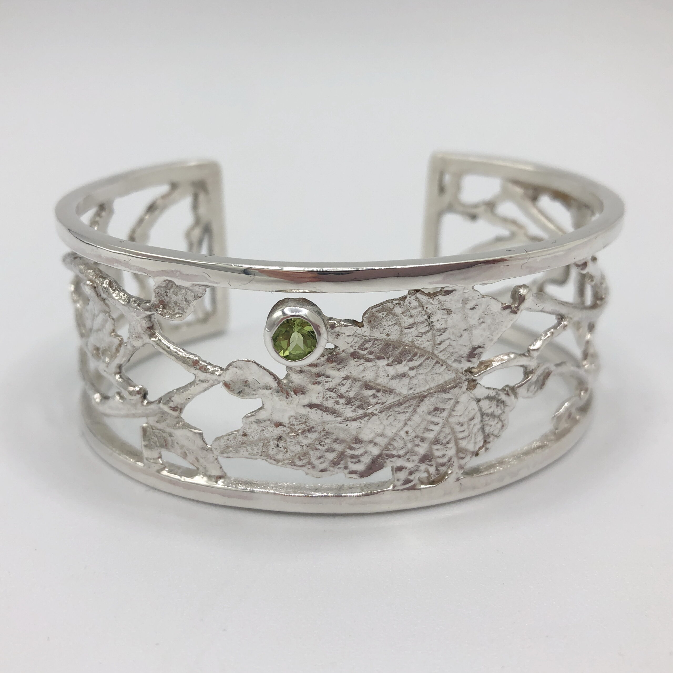 Tangled Garden Series Cuff with Peridot by Andrea Russell at The Avenue Gallery, a contemporary fine art gallery in Victoria, BC, Canada.