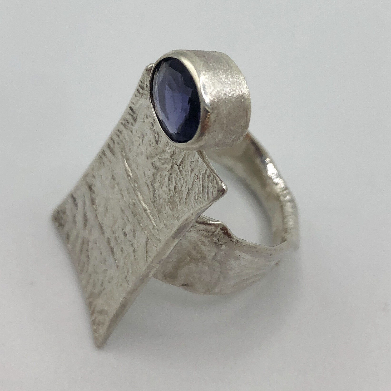 Tanzanite Ring with Wide Reticulated Band & Rectangle Top by Andrea Russell at The Avenue Gallery, a contemporary fine art gallery in Victoria, BC, Canada.