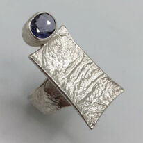 Tanzanite Ring with Wide Reticulated Band & Rectangle Top by Andrea Russell at The Avenue Gallery, a contemporary fine art gallery in Victoria, BC, Canada.