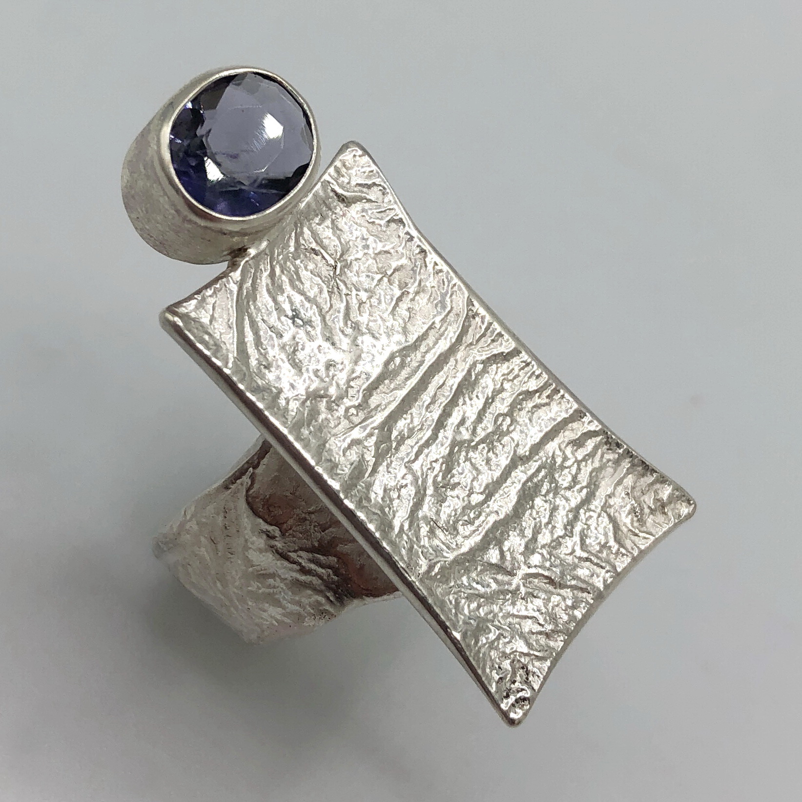 Tanzanite Ring with Wide Reticulated Band & Rectangle Top by Andrea Russell at The Avenue Gallery, a contemporary fine art gallery in Victoria, BC, Canada.