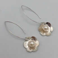Hammered Silver Flower Earrings with White Pearls by Chi's Creations at The Avenue Gallery, a contemporary fine art gallery in Victoria, BC, Canada.