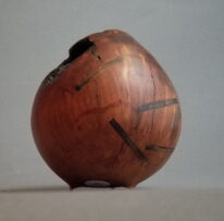 Arbutus Burl Hollow Form by Robert Wilman at The Avenue Gallery, a contemporary fine art gallery in Victoria, BC, Canada.