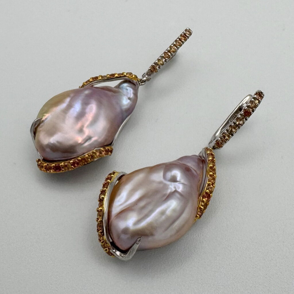 Pink Baroque Pearl & Sapphire Earrings by Val Nunns at The Avenue Gallery, a contemporary fine art gallery in Victoria, BC, Canada.