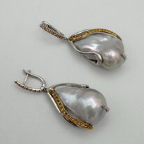 White Baroque Pearl & Yellow Sapphire Earrings by Val Nunns at The Avenue Gallery, a contemporary fine art gallery in Victoria, BC, Canada.