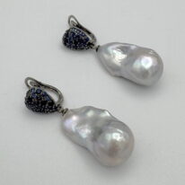 White Baroque Pearl & Blue Sapphire Earrings by Val Nunns at The Avenue Gallery, a contemporary fine art gallery in Victoria, BC, Canada.