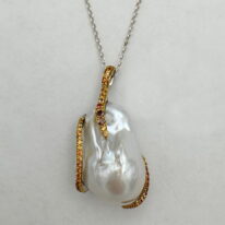 Baroque Pearl & Sapphire Pendant by Val Nunns at The Avenue Gallery, a contemporary fine art gallery in Victoria, BC, Canada.
