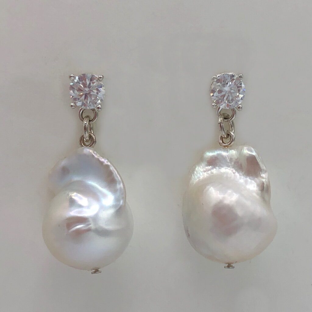 White Baroque Pearl & Lab Grown Diamond Earrings by Val Nunns at The Avenue Gallery, a contemporary fine art gallery in Victoria, BC, Canada.