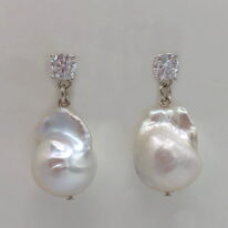 White Baroque Pearl & Lab Grown Diamond Earrings by Val Nunns at The Avenue Gallery, a contemporary fine art gallery in Victoria, BC, Canada.