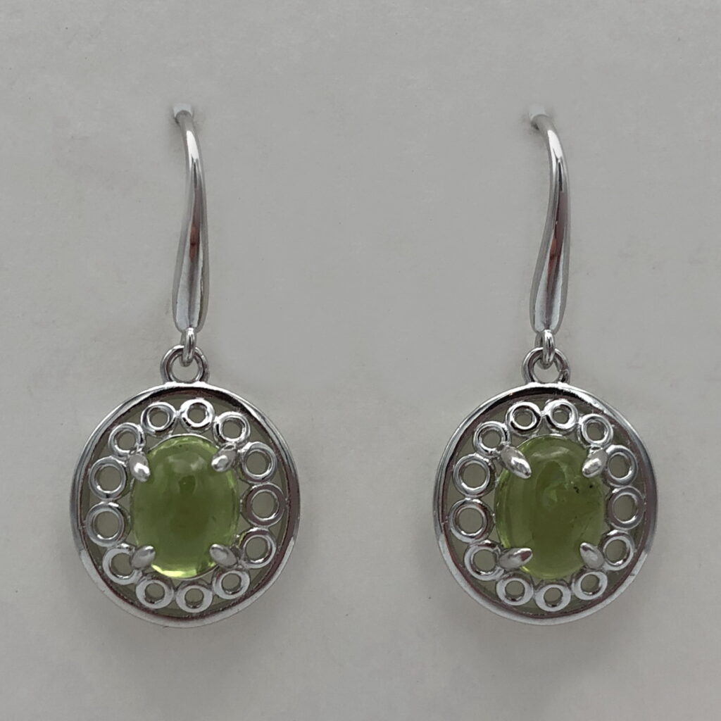 Sterling Silver Earrings with Peridot Cabochon by Val Nunns at The Avenue Gallery, a contemporary fine art gallery in Victoria, BC, Canada.